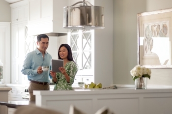 couple looking at a tablet